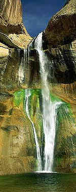 water flowing down the side of a cliff