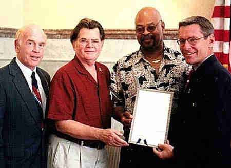 photo of mayor luken presenting proclamation - read caption