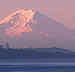 portion of photo showing vashon island ferry arriving with mt. rainier in background