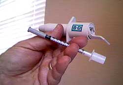 inject-ease held in manny's hand